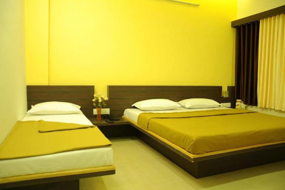 Фото Hotel Om Executive