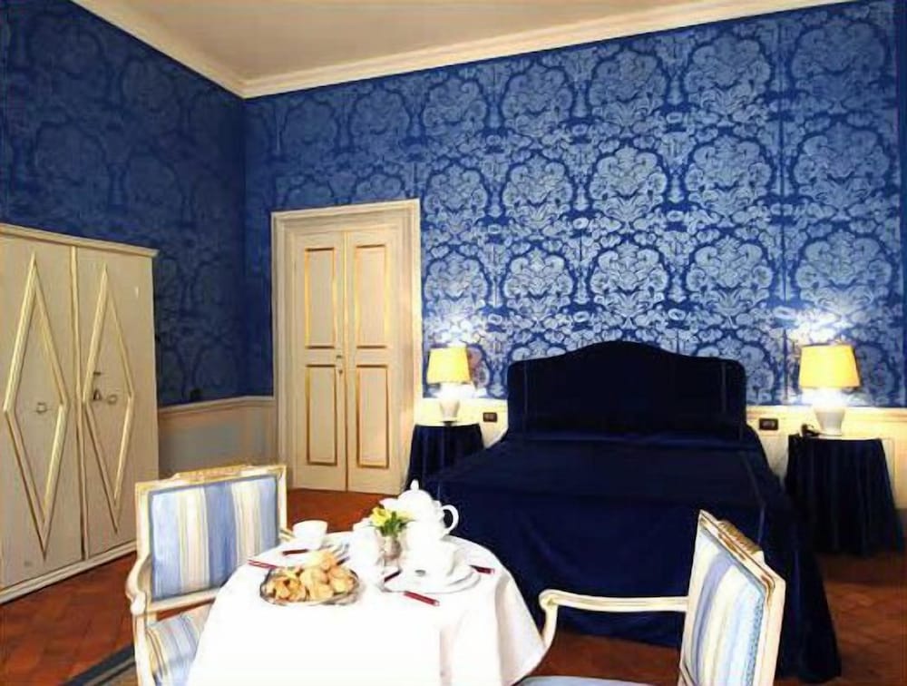 Фото Palazzo Tucci Residenza d'Epoca