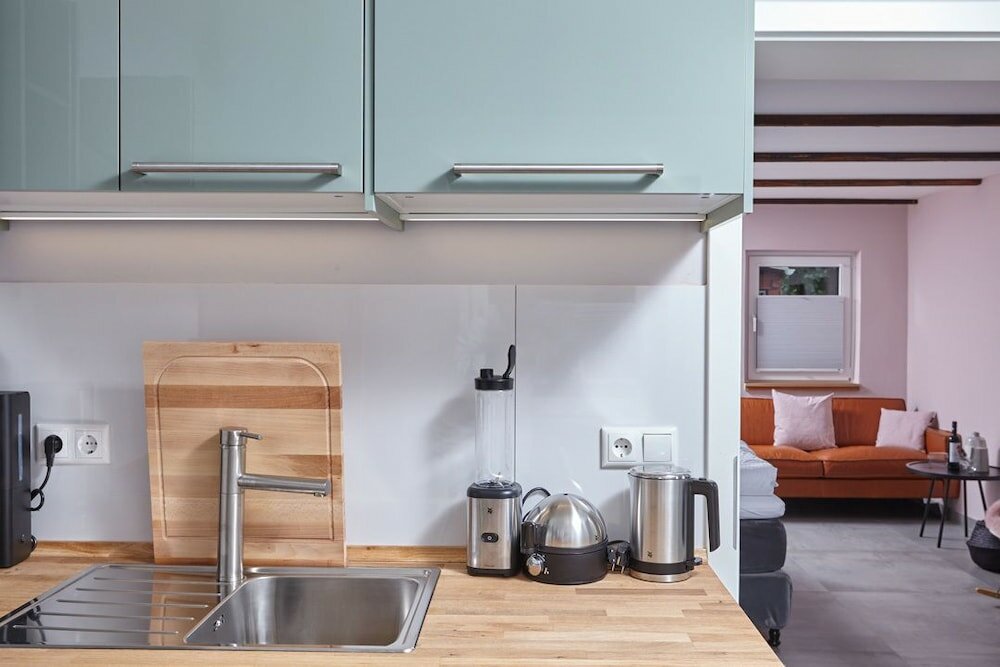 Фото Ferienhaus & Appartments Düneneck 8