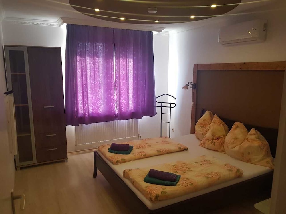 Фото Sunrise Apartmanház