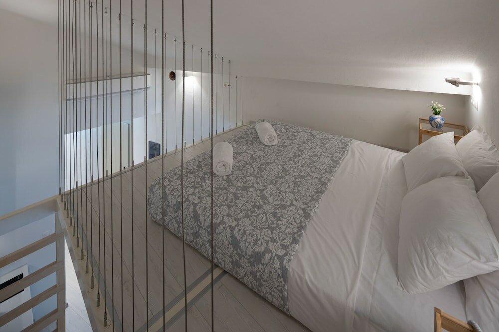 Фото L Anima Boutique Suites