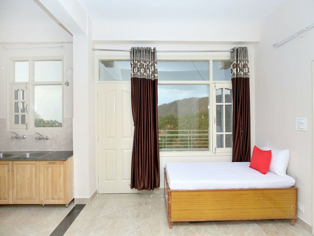 Фото Oyo 13433 Home Kasauli View 2bhk Dharampur