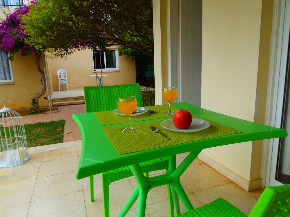 Фото Light & Blue Gardens Apartments