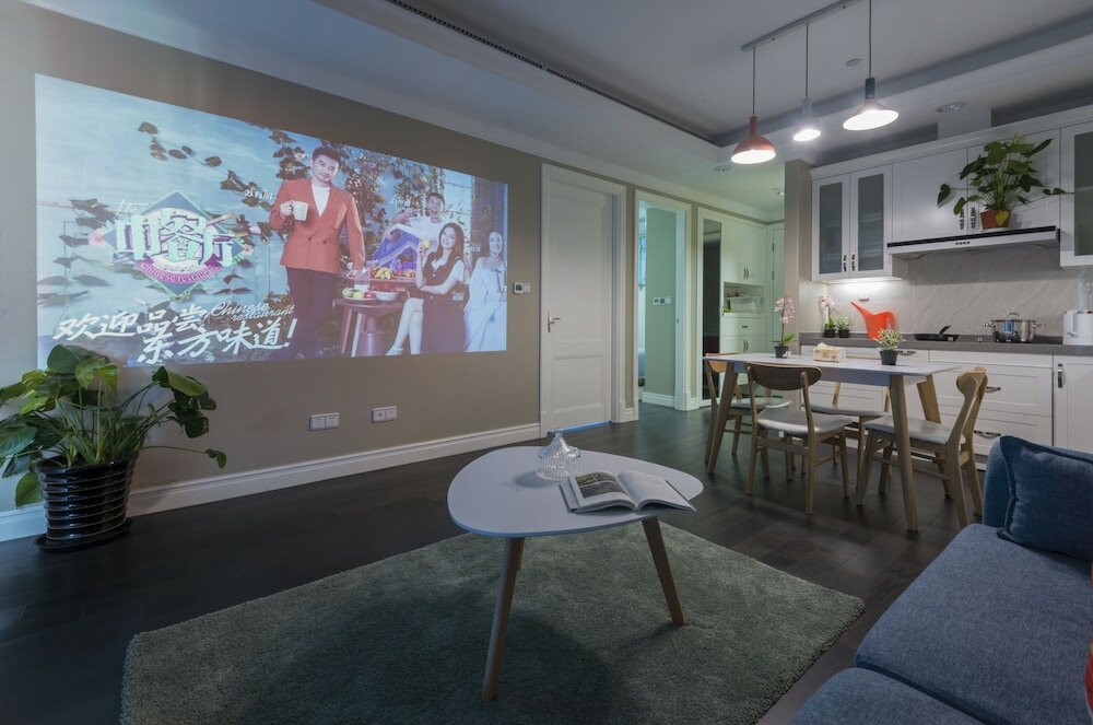 Фото Shanghai Xinchuan Boutique Apartment