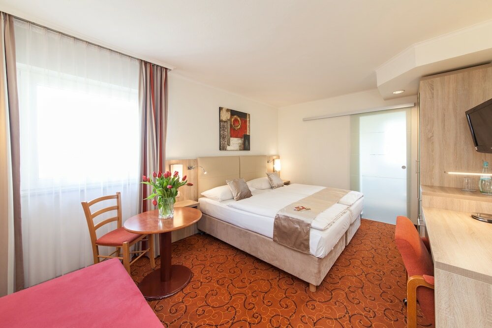 Фото Novum Hotel Garden