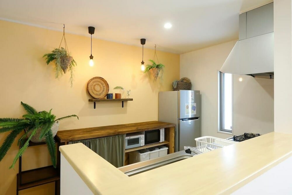 Фото Condomium Motobu Sakura Terrace