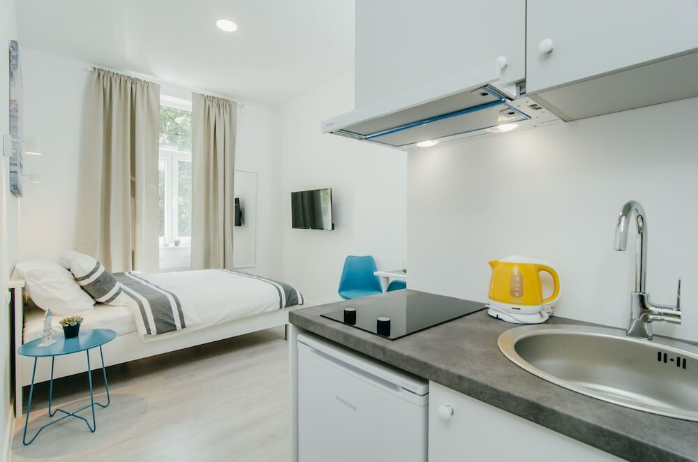 Фото Sia Downtown Apartments