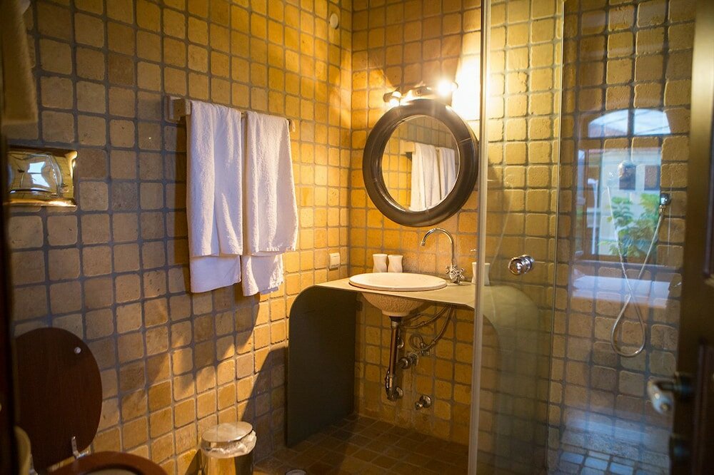 Фото Oikoperiigitis Hotel