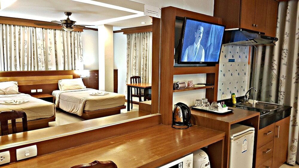 Фото Green Harbor Hotel & Service Apartment