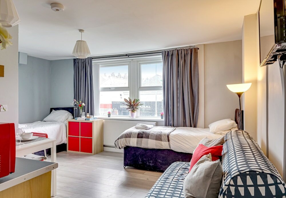 Фото Grey Stone Studio Apartments