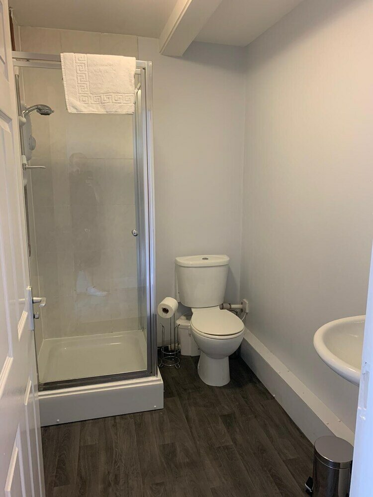 Фото Grey Stone Studio Apartments