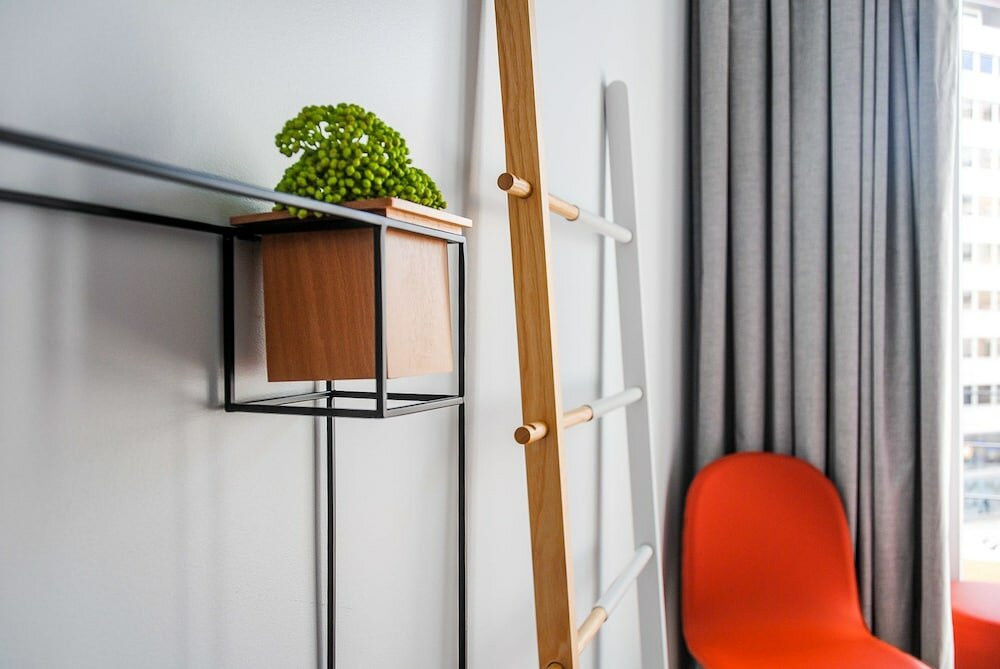 Фото Nlc Rooms & Suites