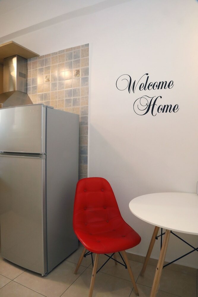 Фото Metaxourghio Boutique Apartment