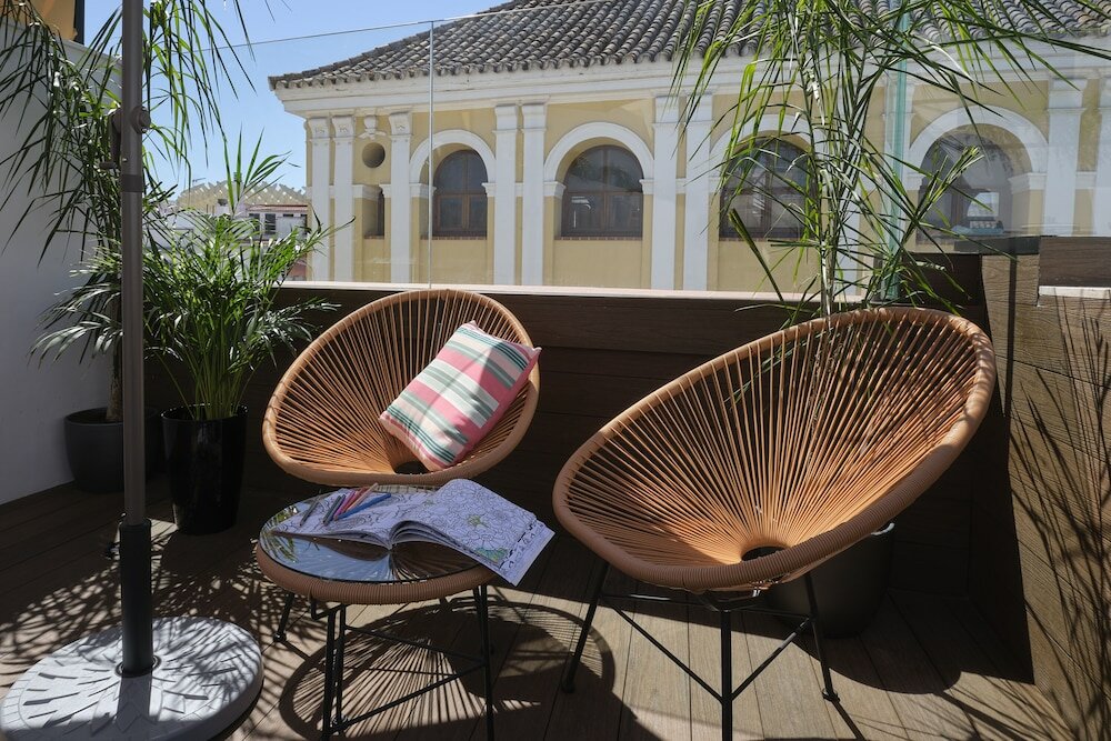 Фото Sweet Sevilla Suites