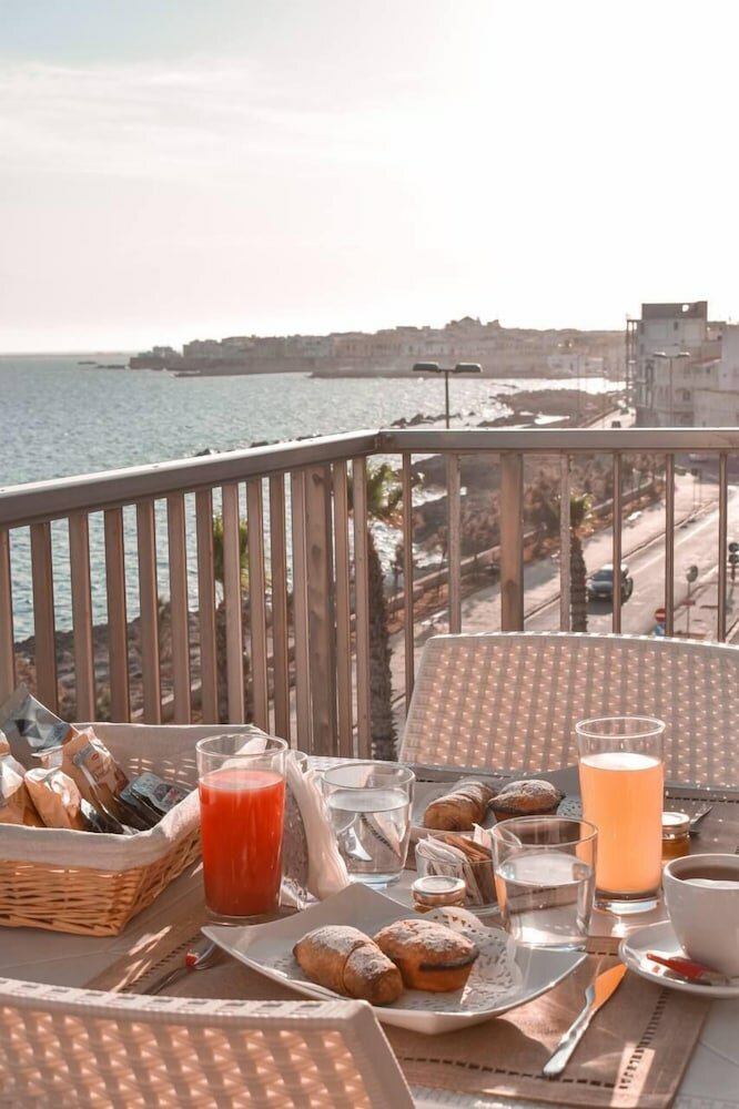 Фото La Scogliera