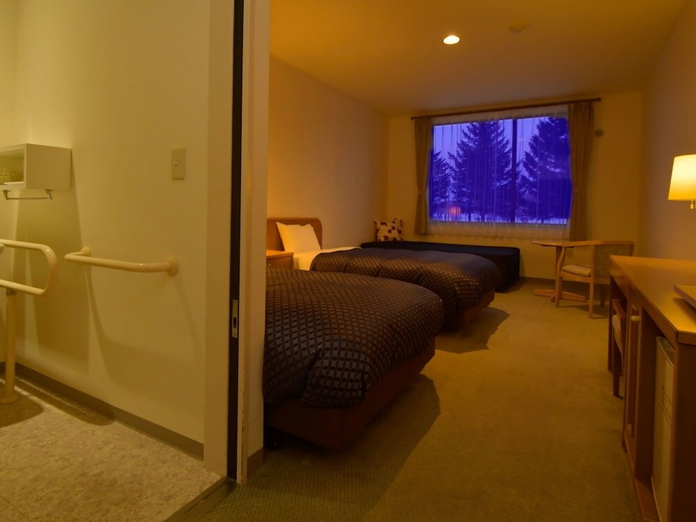 Фото Niikappu Onsen Hotel Hills