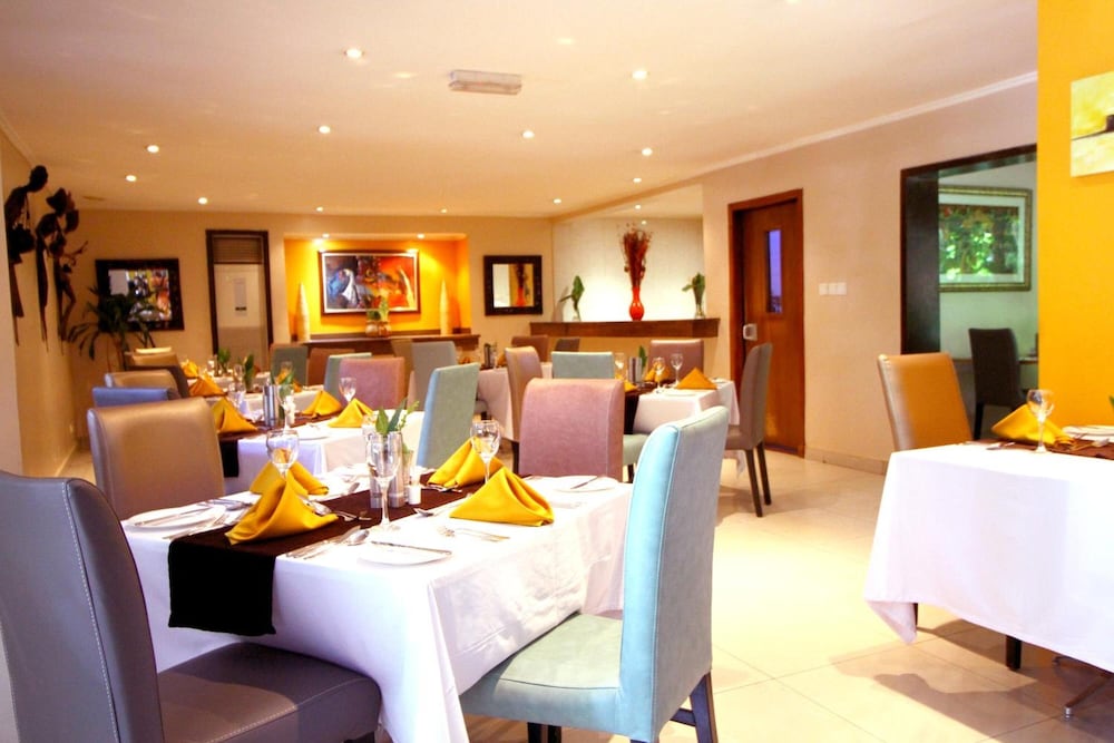 Фото La Cour Hotel Apartments