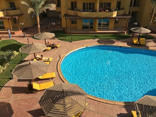 Гостиница Pool View Apart At British Resort 1334 в Хургаде