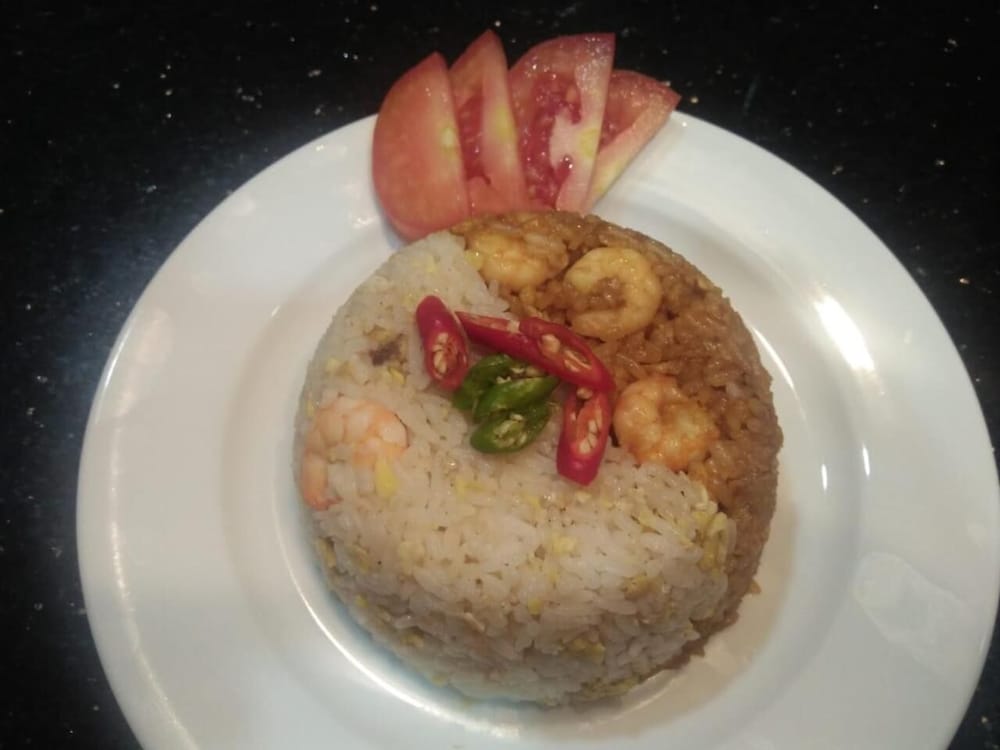 Фото Omah Madam Bed & Breakfast