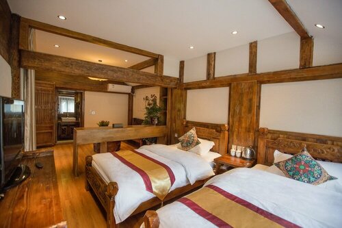 Гостиница The Purplevine Inn Lijiang