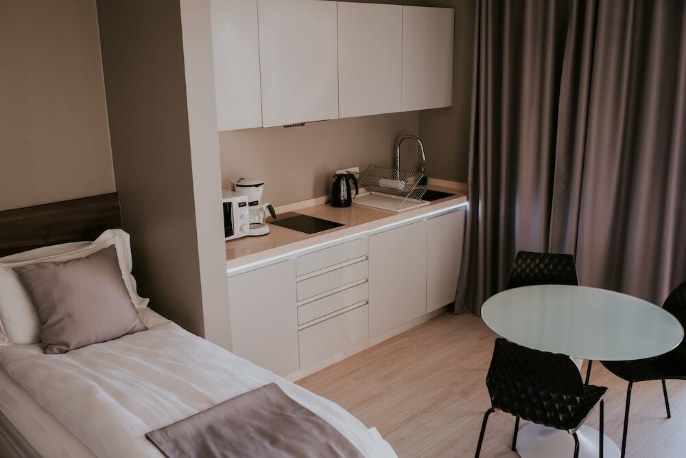 Фото Black Beach Suites