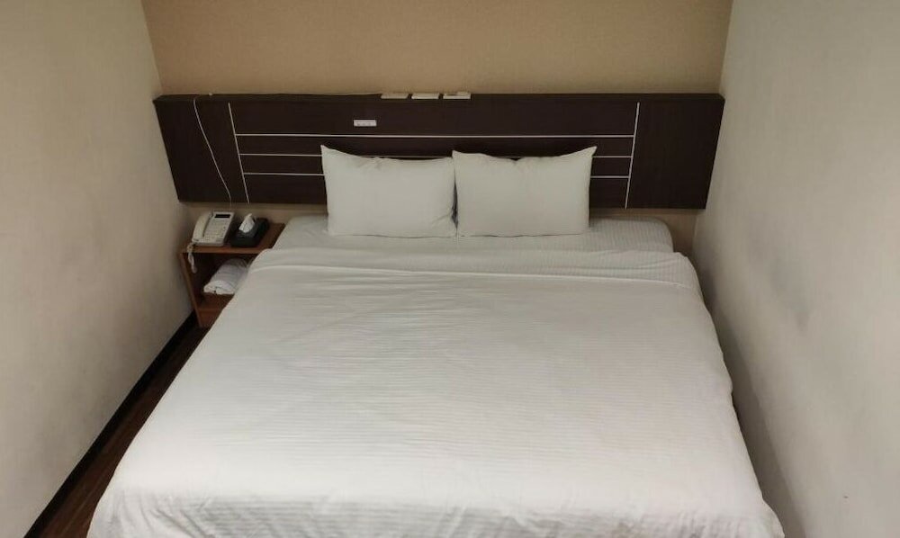 Фото Jhong-Sing Hotel