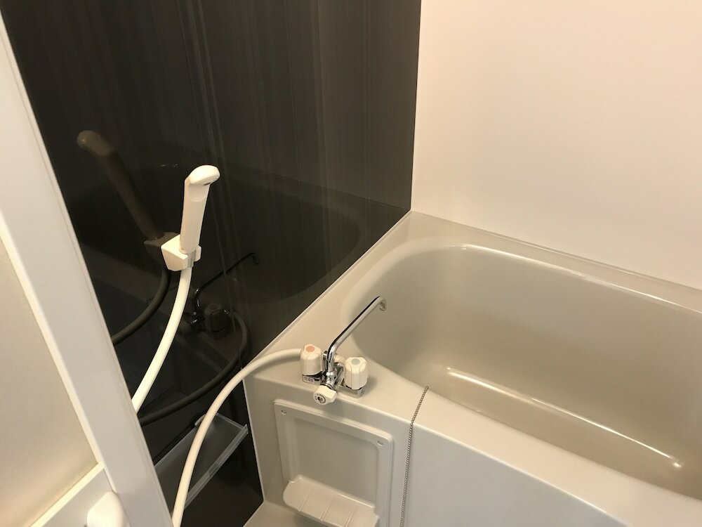 Фото Weekly Harbor View Mansion Ginowan