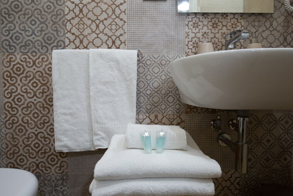 Фото Musto Suites & Rooms