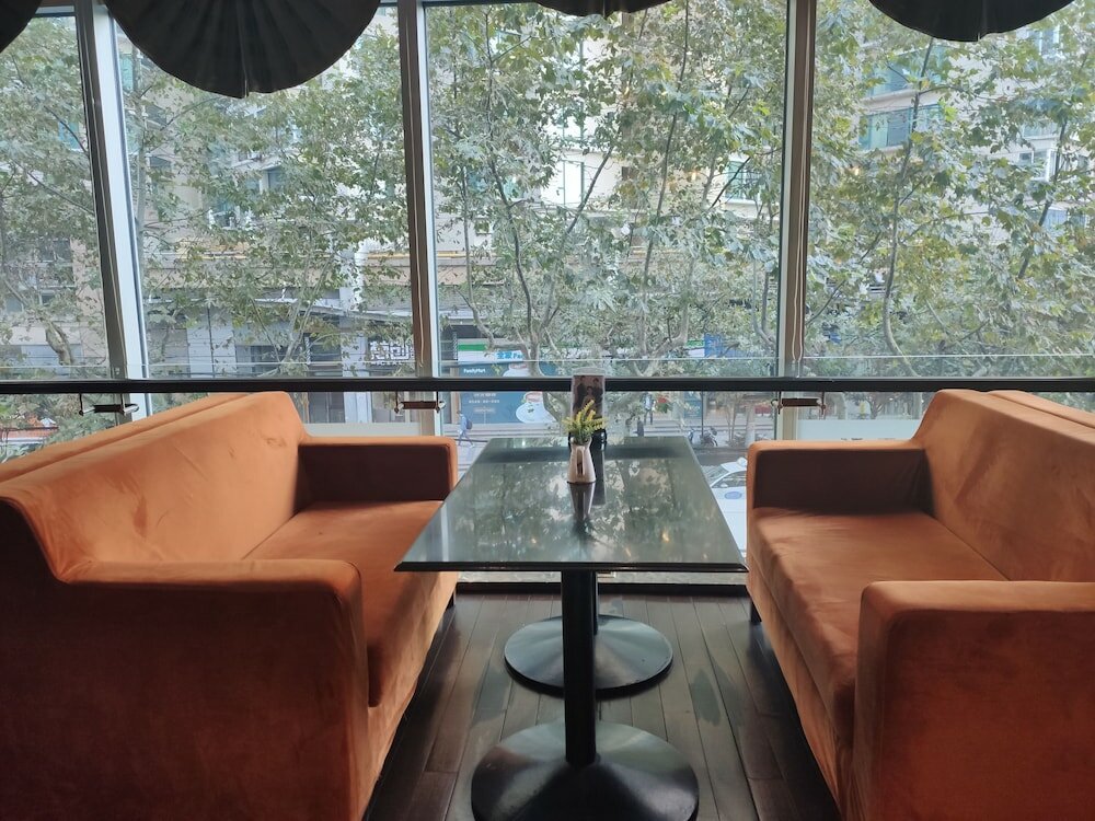 Фото Shanghai Yueyi Apartment Hotel