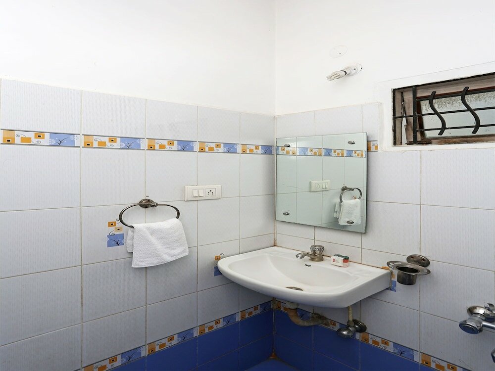 Фото Oyo 8932 Delight Inn Gachibowli