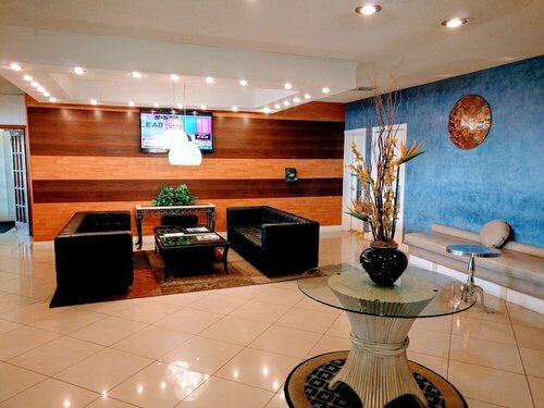 Гостиница Red Carpet Inn Airport/Cruiseport в Дания Бич