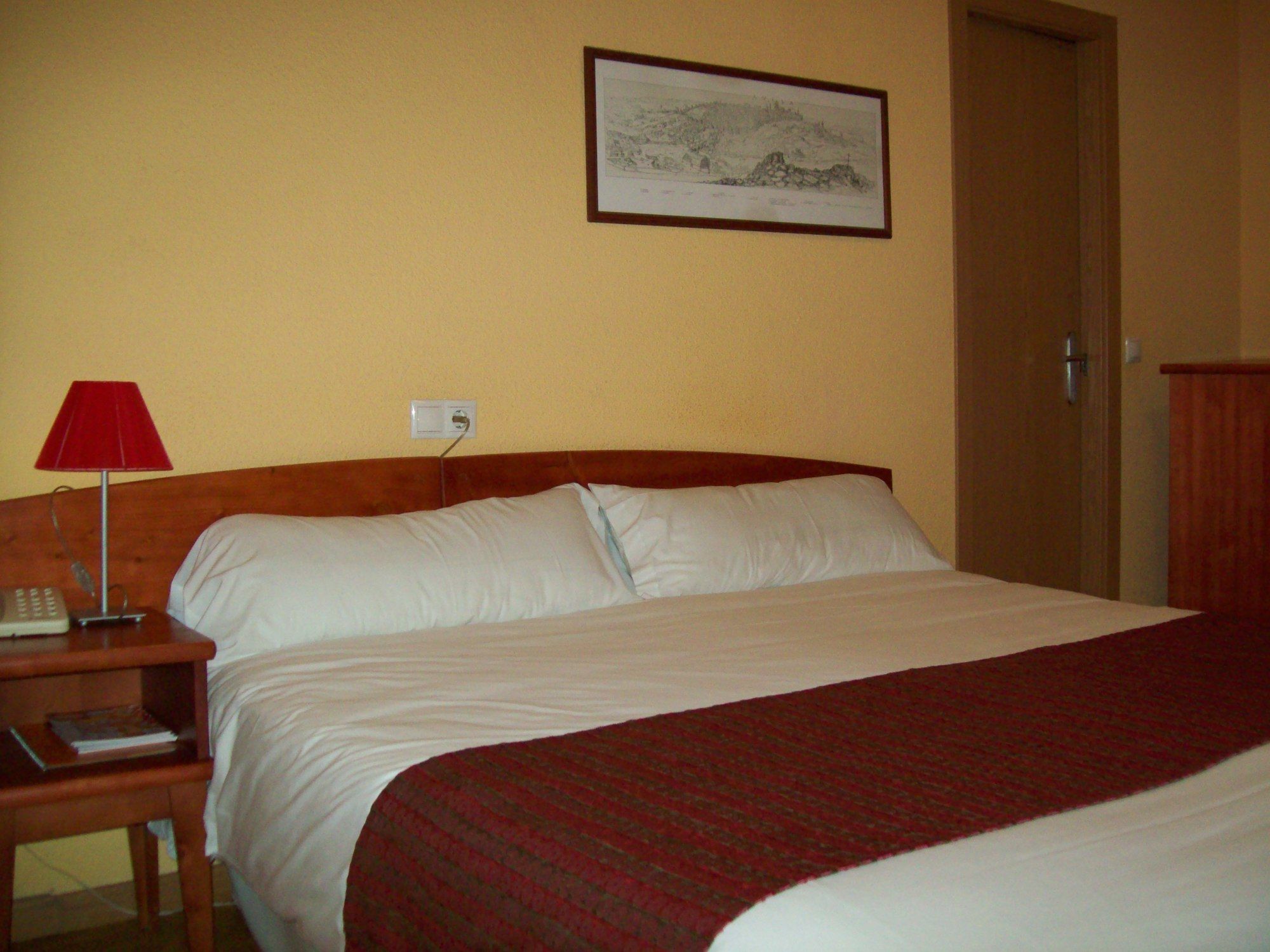 Фото Hostal Restaurante Puerta del Alcázar