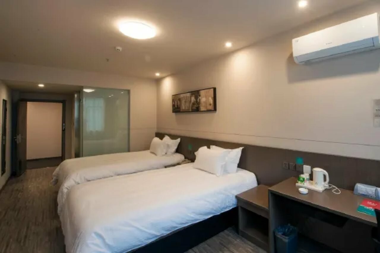 Фото Jinjiang Inn Style Xinyu Railway Station