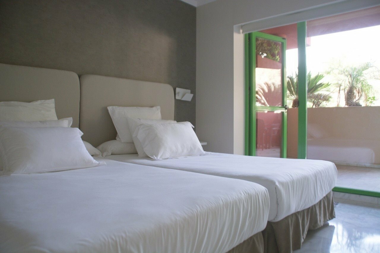 Фото Holiday World Riwo Hotel