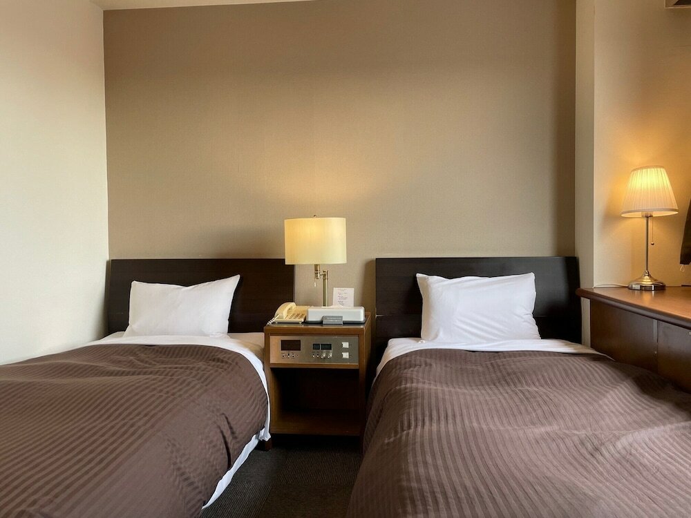 Фото Kanku Hotel Sunplus Yutaka