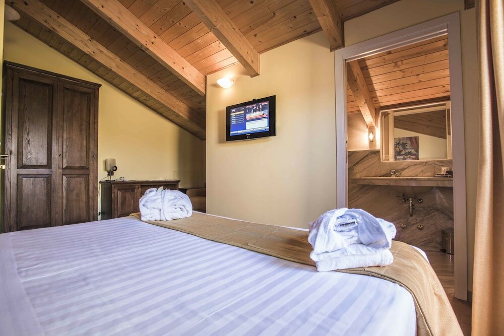 Фото Oste del Castello Wellness & Bike Hotel