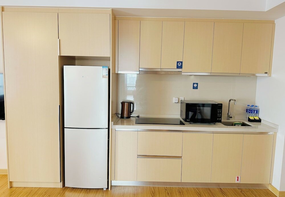 Фото Joysuites Nantong