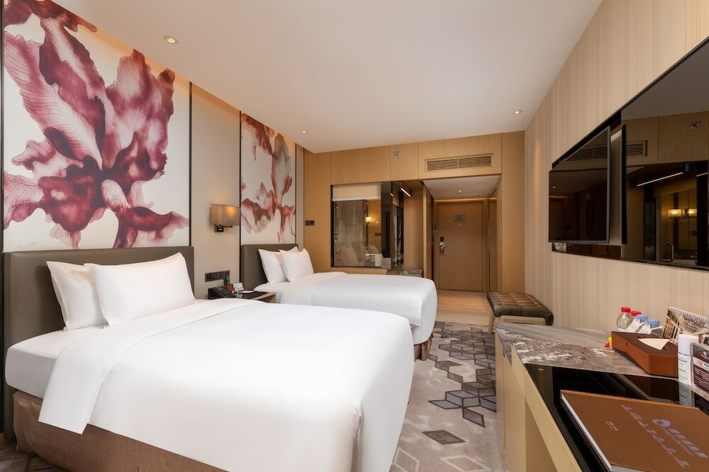 Фото Zhuhai LongZhuDa International Hotel