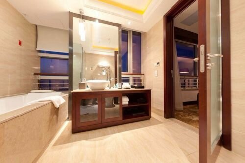 Гостиница Grand New Century Hotel в Циндао