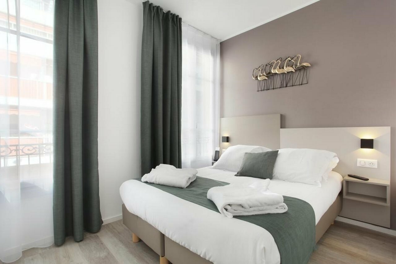 Фото The Alcove Hotel