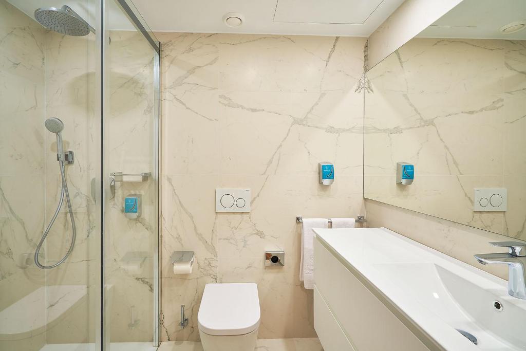 Фото Tandem Torres De Cádiz Suites