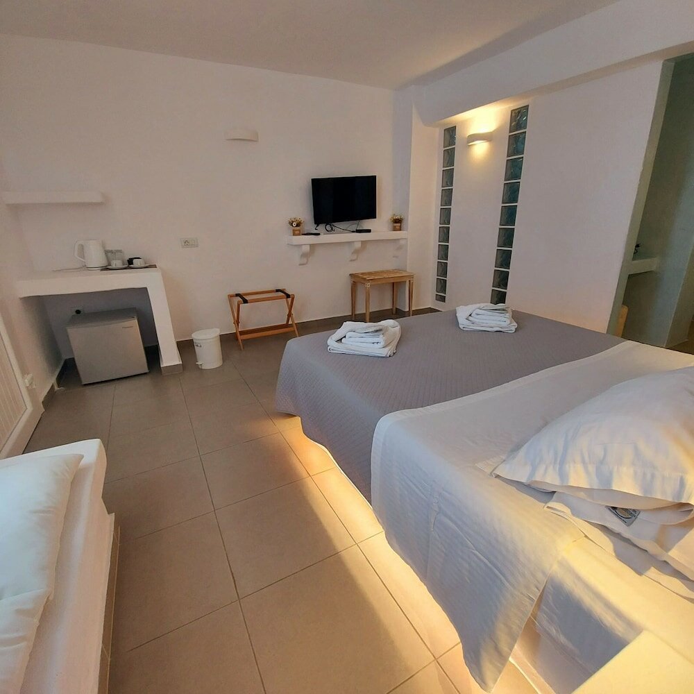 Фото Ambience Suites