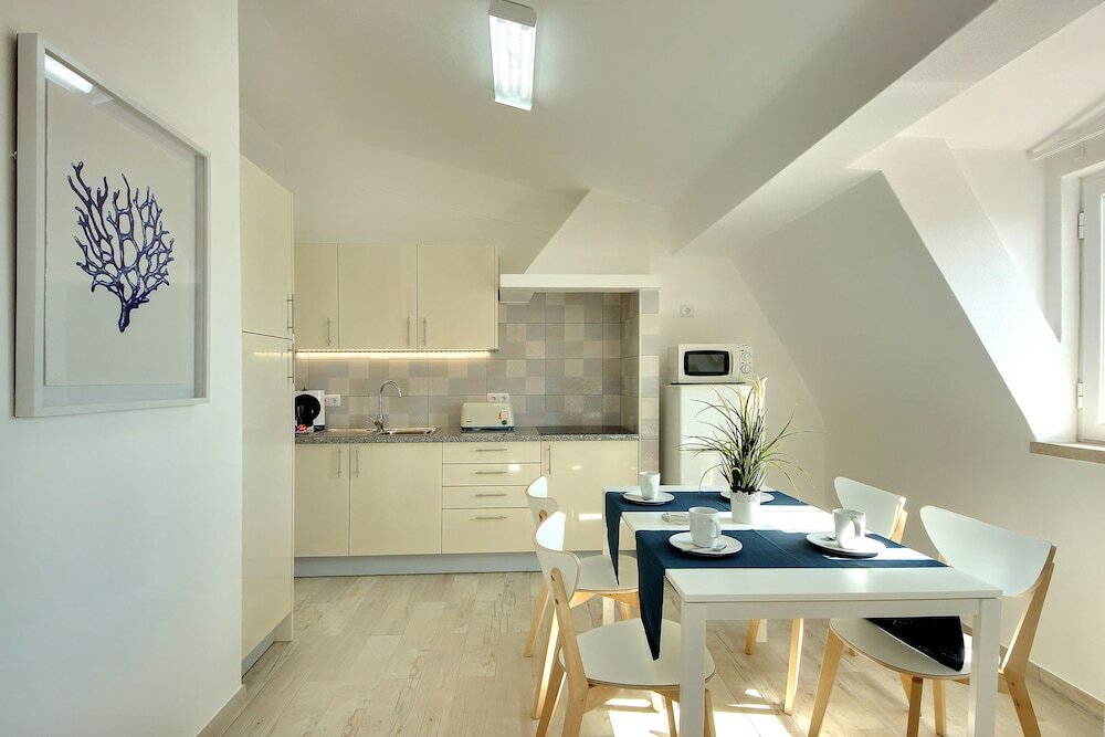 Фото Apartamentos Tucha