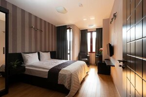 Гостиница CityHome Aparthotel