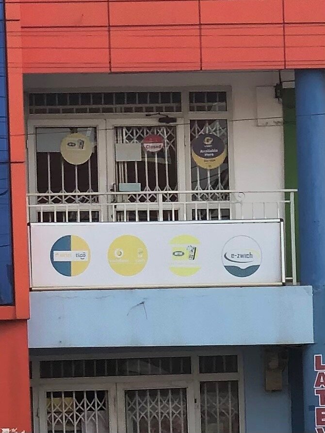 Money transfers Mobile Money Agent, Earth, photo