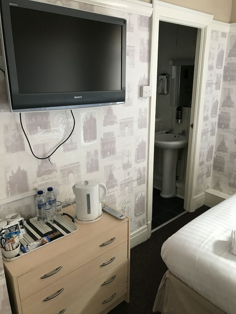 Фото Queens Plaza Hotel