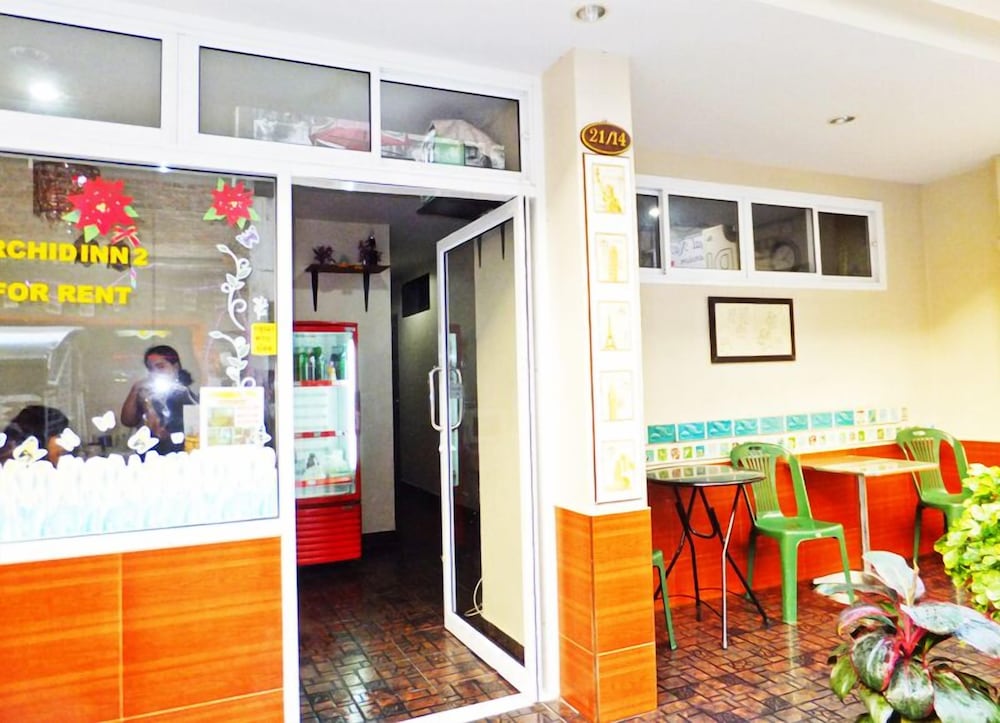 Фото White Orchid Inn