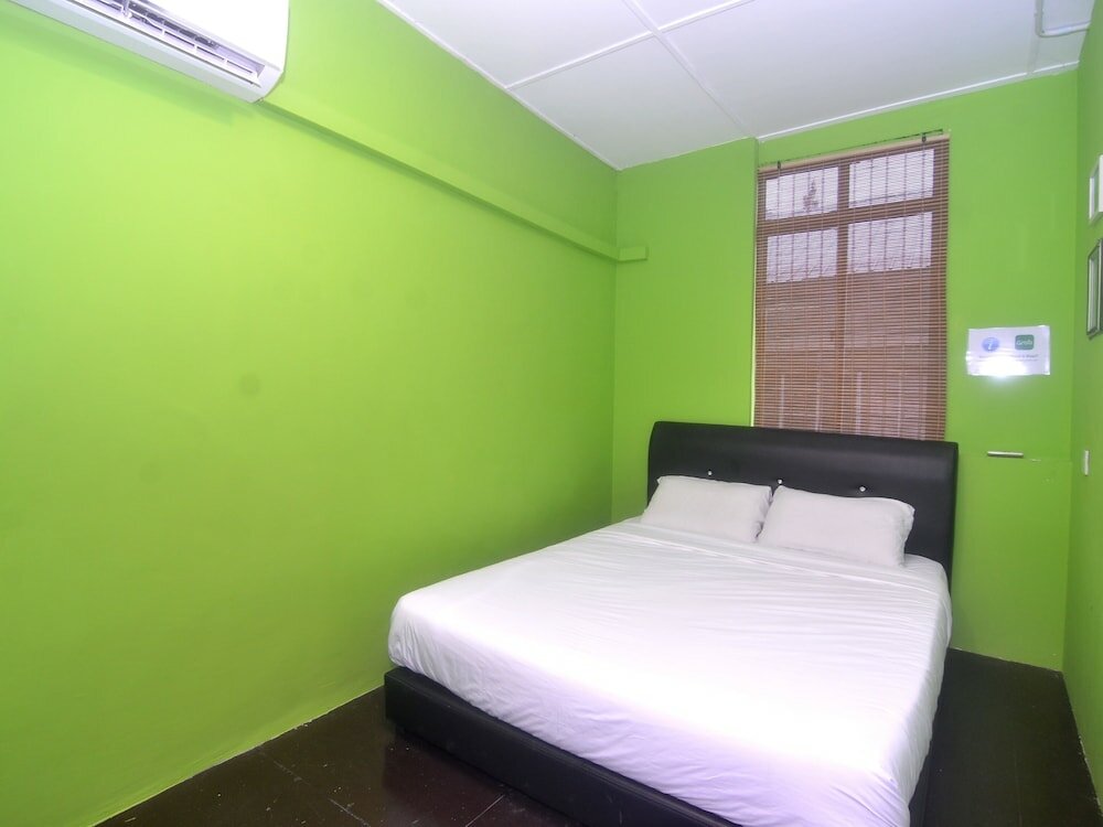 Фото Spot On 89929 Tropical Lodge