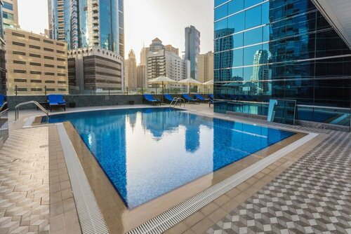 Внешний вид отеля Golden Tulip Media в Городе Дубае дле медие 2, фото 4