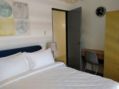 Гостиница Unwnd Residences Dumaguete в Думагете
